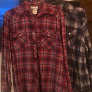 Two men’s wrangler long sleeve shirts